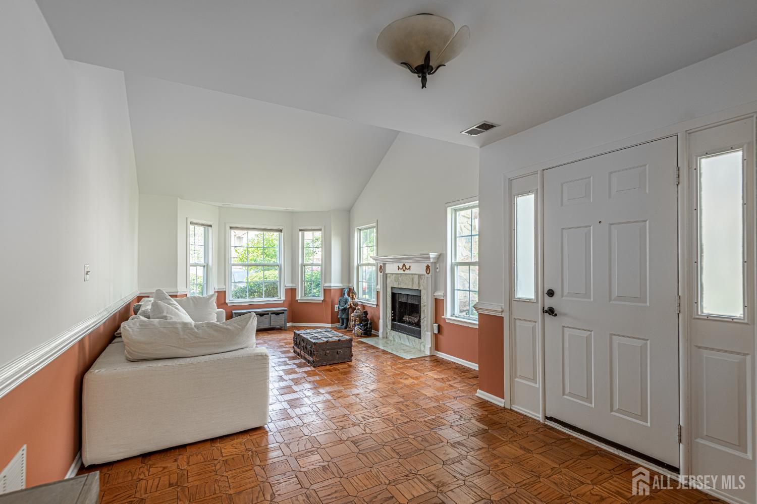 328 Lunar Road Piscataway, NJ 08854 - Photo 5 of 18 a living room with furniture and a large window