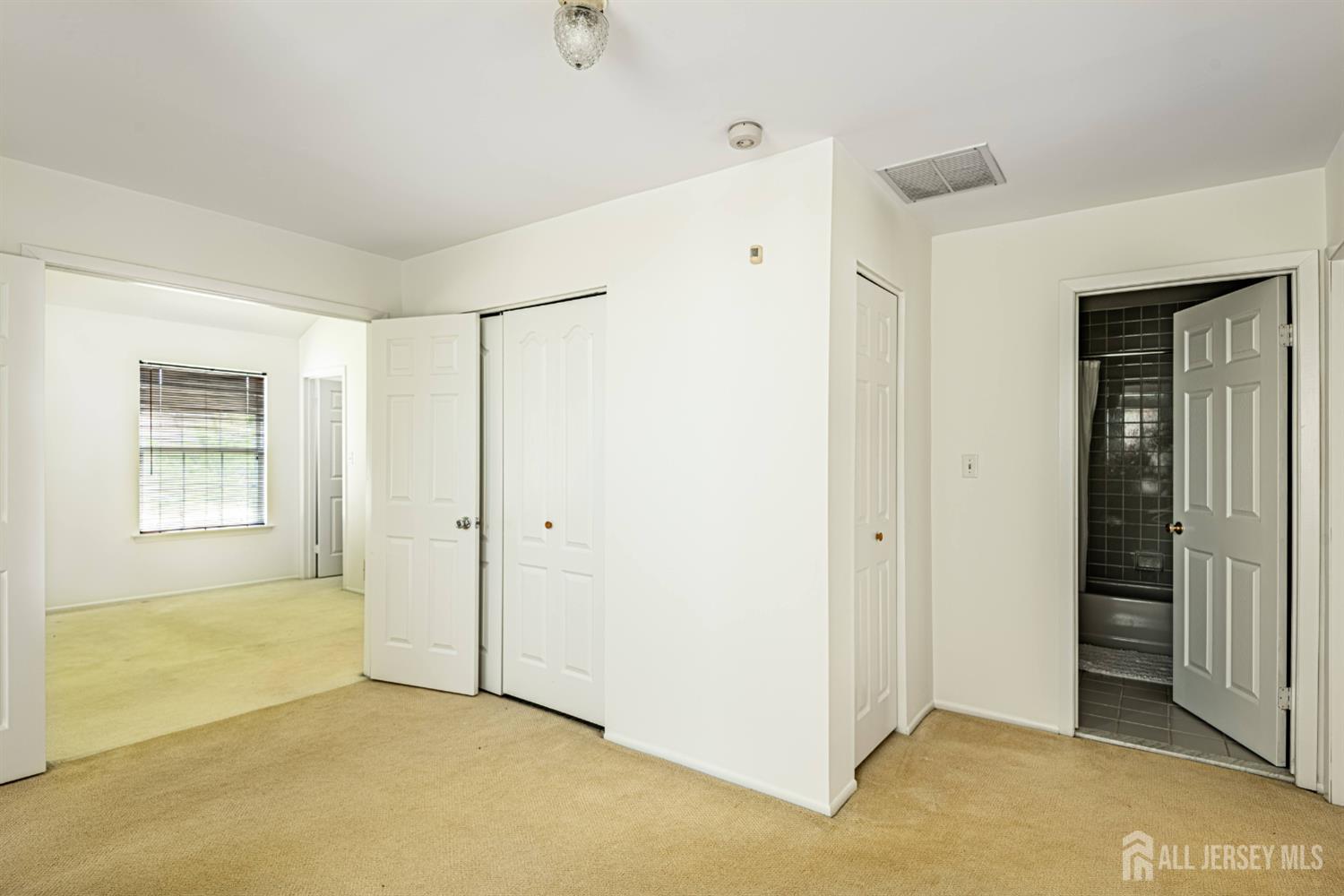 328 Lunar Road Piscataway, NJ 08854 - Photo 10 of 18 a view of an empty room with a window
