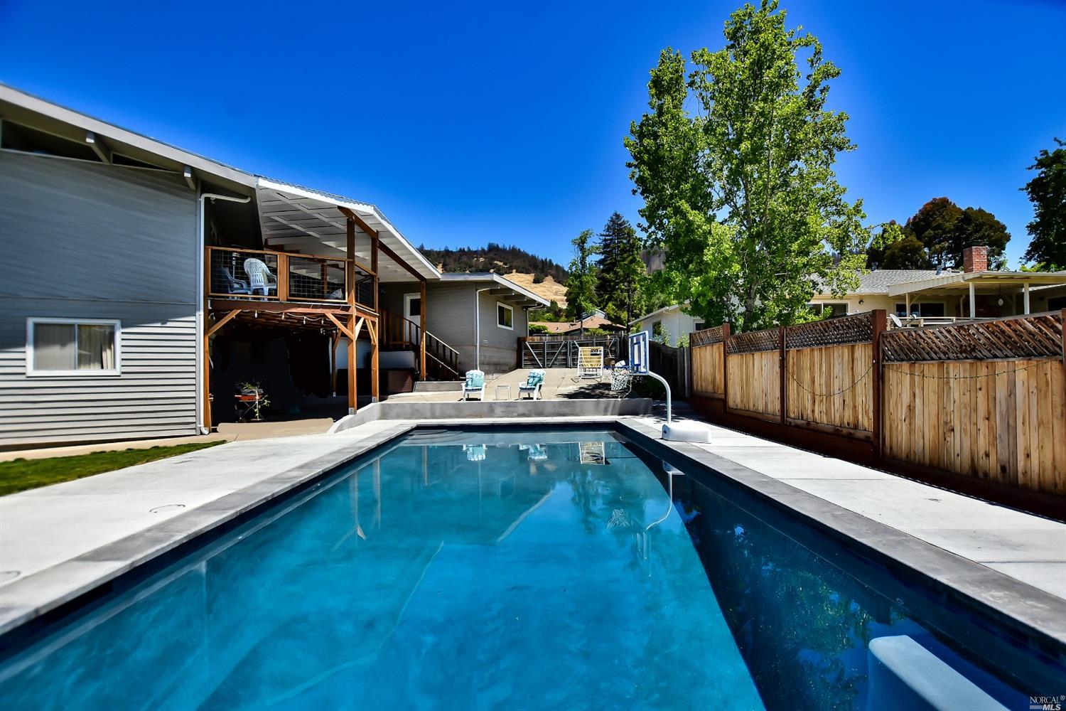 5810 Yerba Buena Road Santa Rosa, CA 95409 - Photo 1 of 1 a view of a house with pool and sitting area