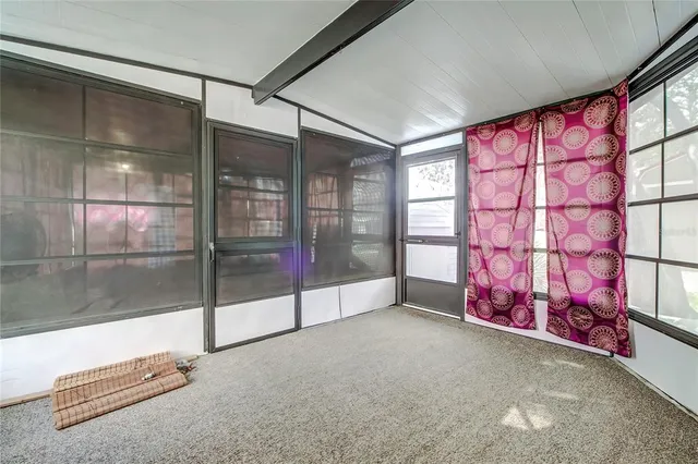 a room with toys and a large window