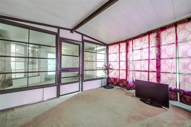 a view of a lake with a yard