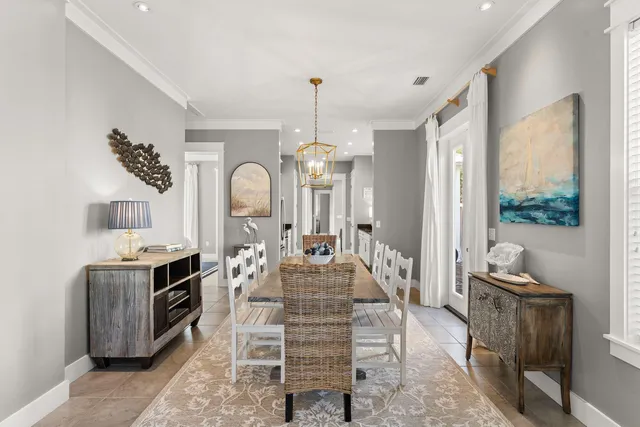 a view of living room filled with furniture and window