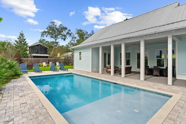 a view of a house with swimming pool