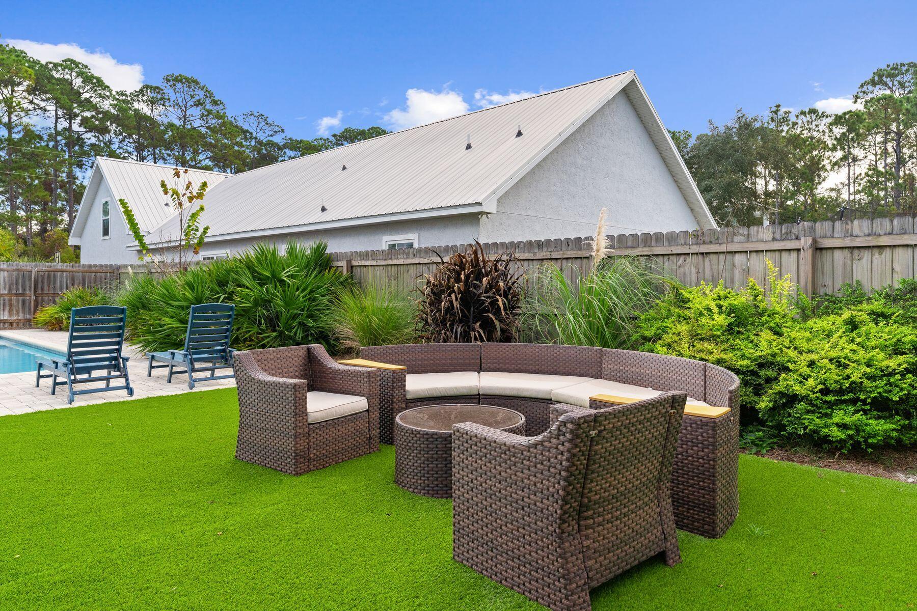 389 Seacrest Drive Seacrest, FL 32461 - Photo 22 of 33 a view of a couches in patio of back yard