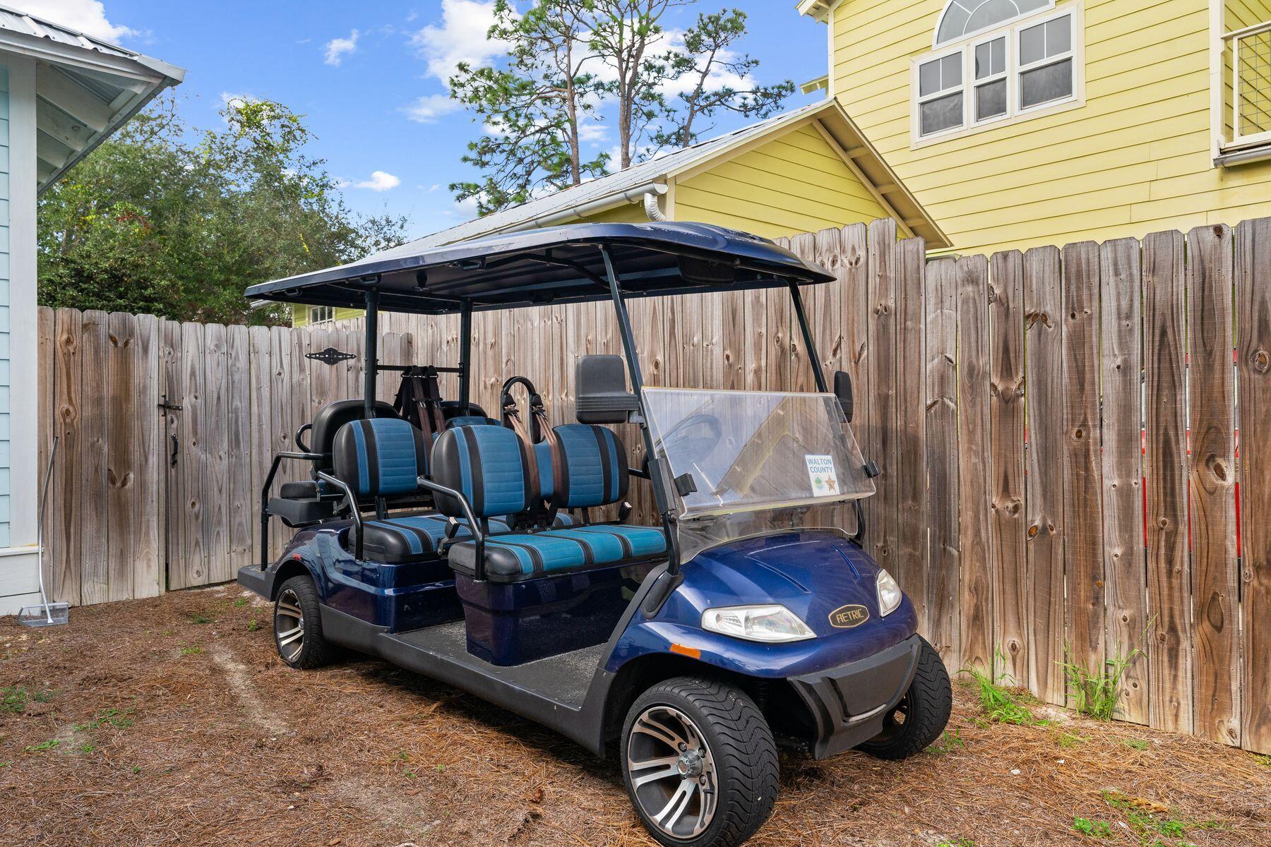 389 Seacrest Drive Seacrest, FL 32461 - Photo 32 of 33 a car parked in front of house