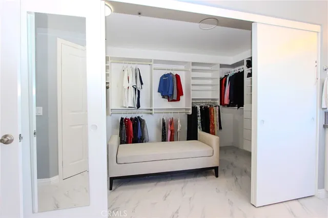 a bedroom with a bed and furniture