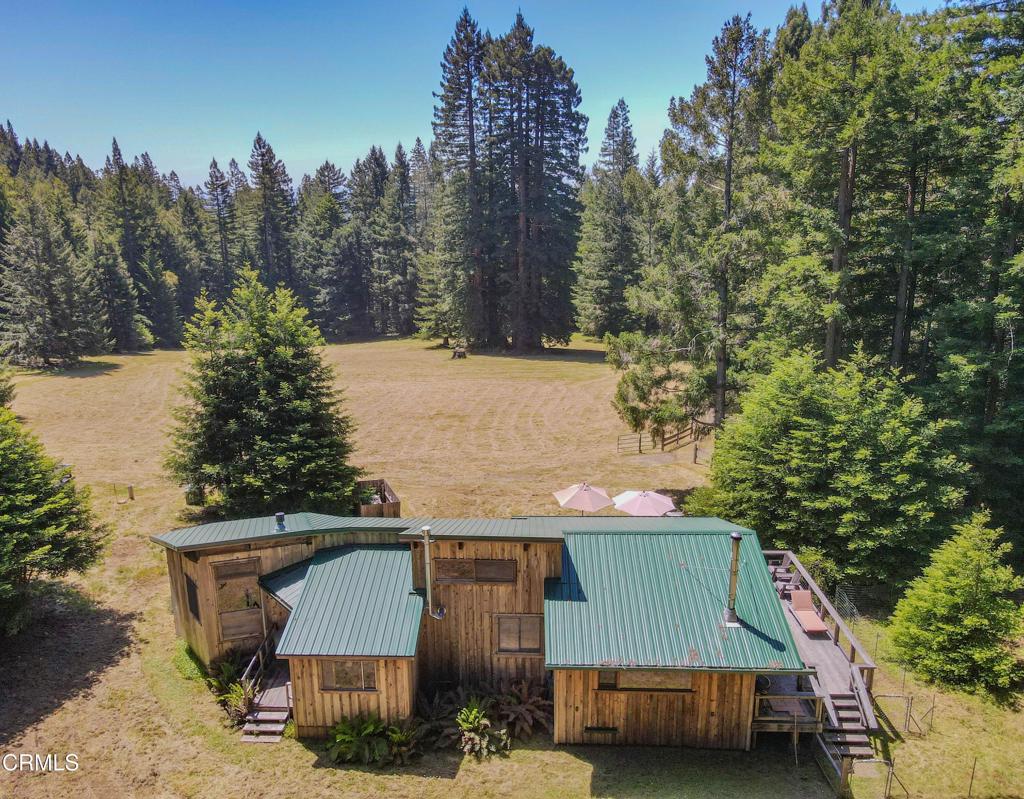 28680 Comptche Ukiah Road Comptche, CA 95427 - Photo 6 of 58 a aerial view of a house with large trees