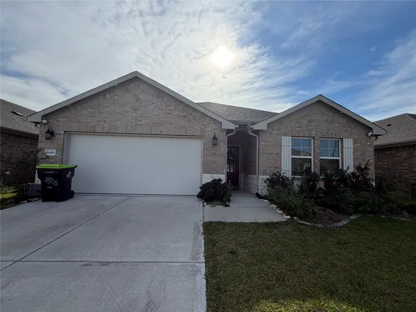 a house view with a garden space