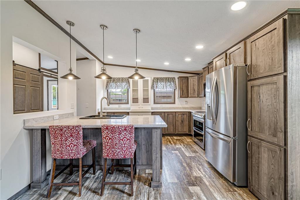 120 Buckeye Road Mount Pleasant, PA 15666 - Photo 9 of 26 Large peninsula with sink, seating, and electrical outlets!