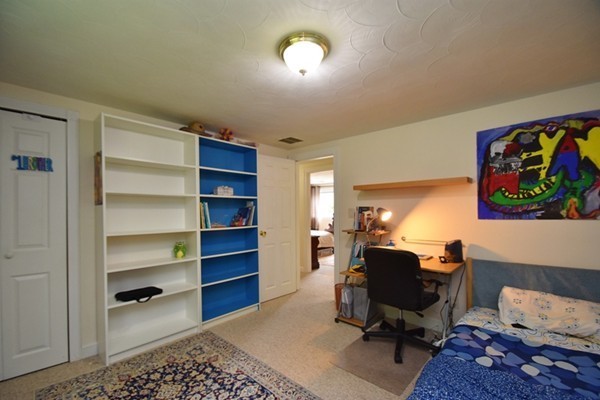 55 Christopher Road Waltham, MA 02451 - Photo 13 of 19 a view of a workspace with furniture and a window