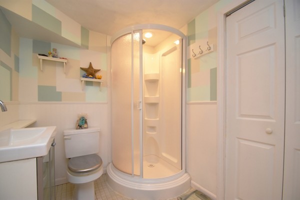 55 Christopher Road Waltham, MA 02451 - Photo 17 of 19 a bathroom with a toilet and a sink