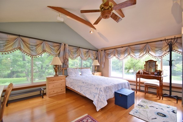 55 Christopher Road Waltham, MA 02451 - Photo 7 of 19 a bedroom with a bed and large window