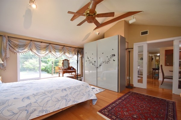 55 Christopher Road Waltham, MA 02451 - Photo 8 of 19 a bed room with a bed and a window