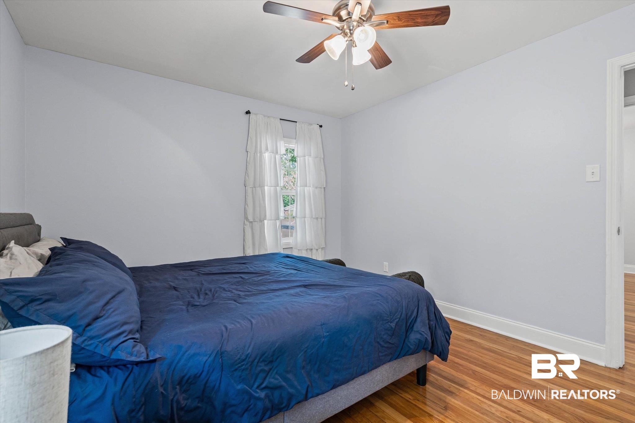 5609 Diane Court Mobile, AL 36618 - Photo 13 of 22 Bedroom featuring wood finished floors and ceiling fan
