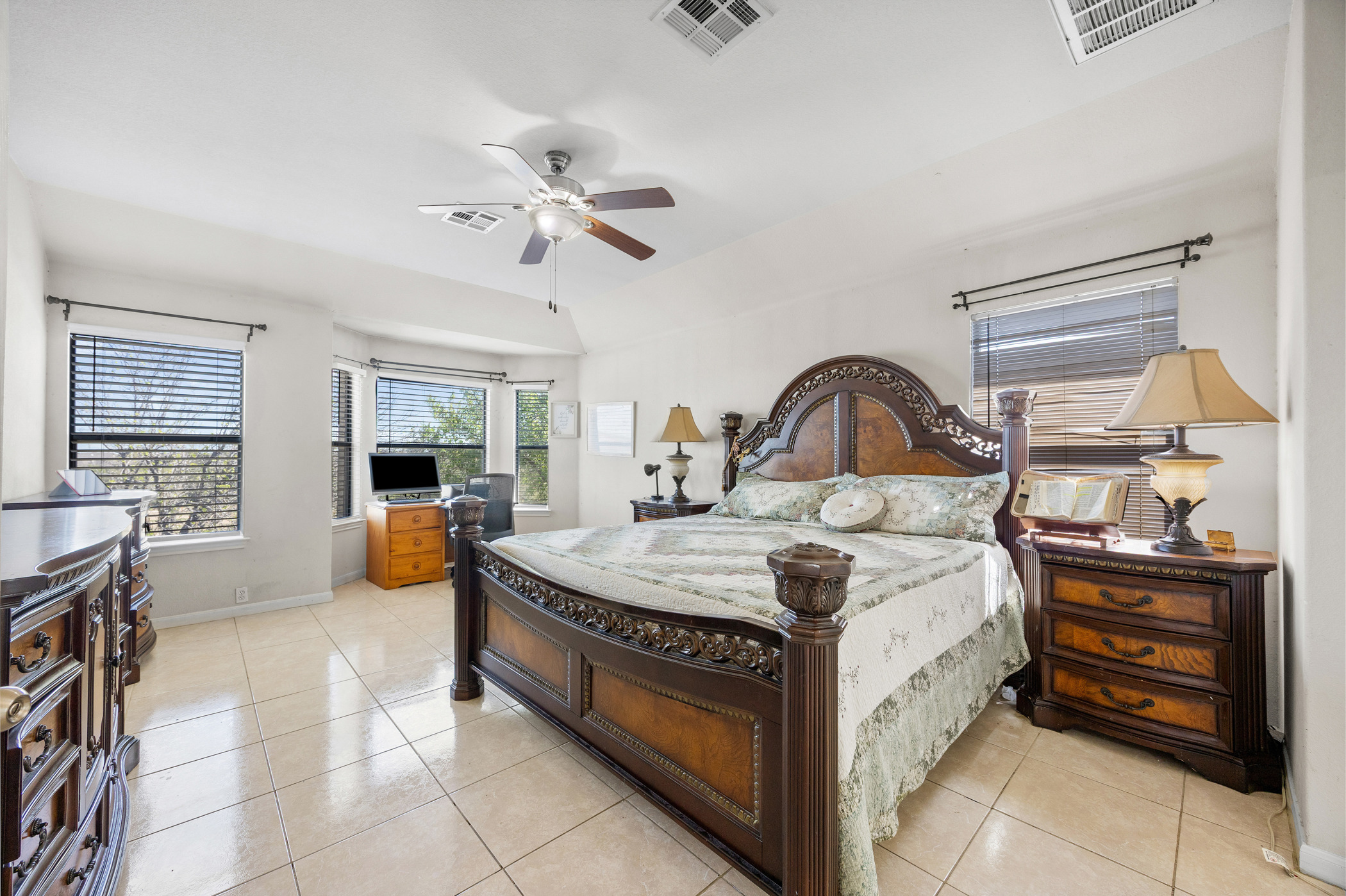 3502 Shiraz Loop Round Rock, TX 78665 - Photo 16 of 23 Bedroom featuring light tile patterned floors and a ceiling fan