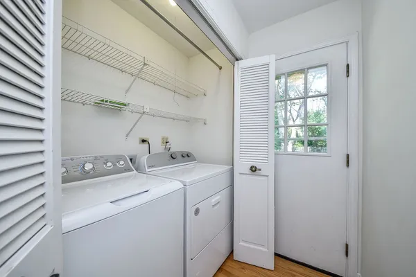 a utility room with dryer and washer