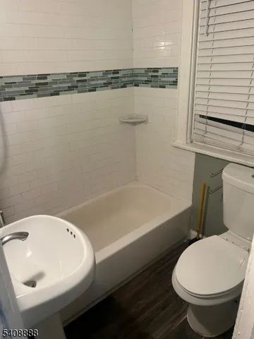 a bathroom with a sink and a toilet