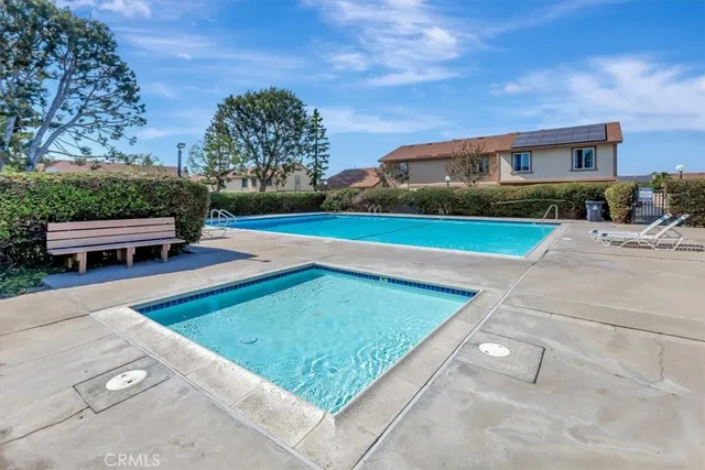swimming pool view with a outdoor space