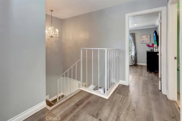 a view of entryway with wooden floor