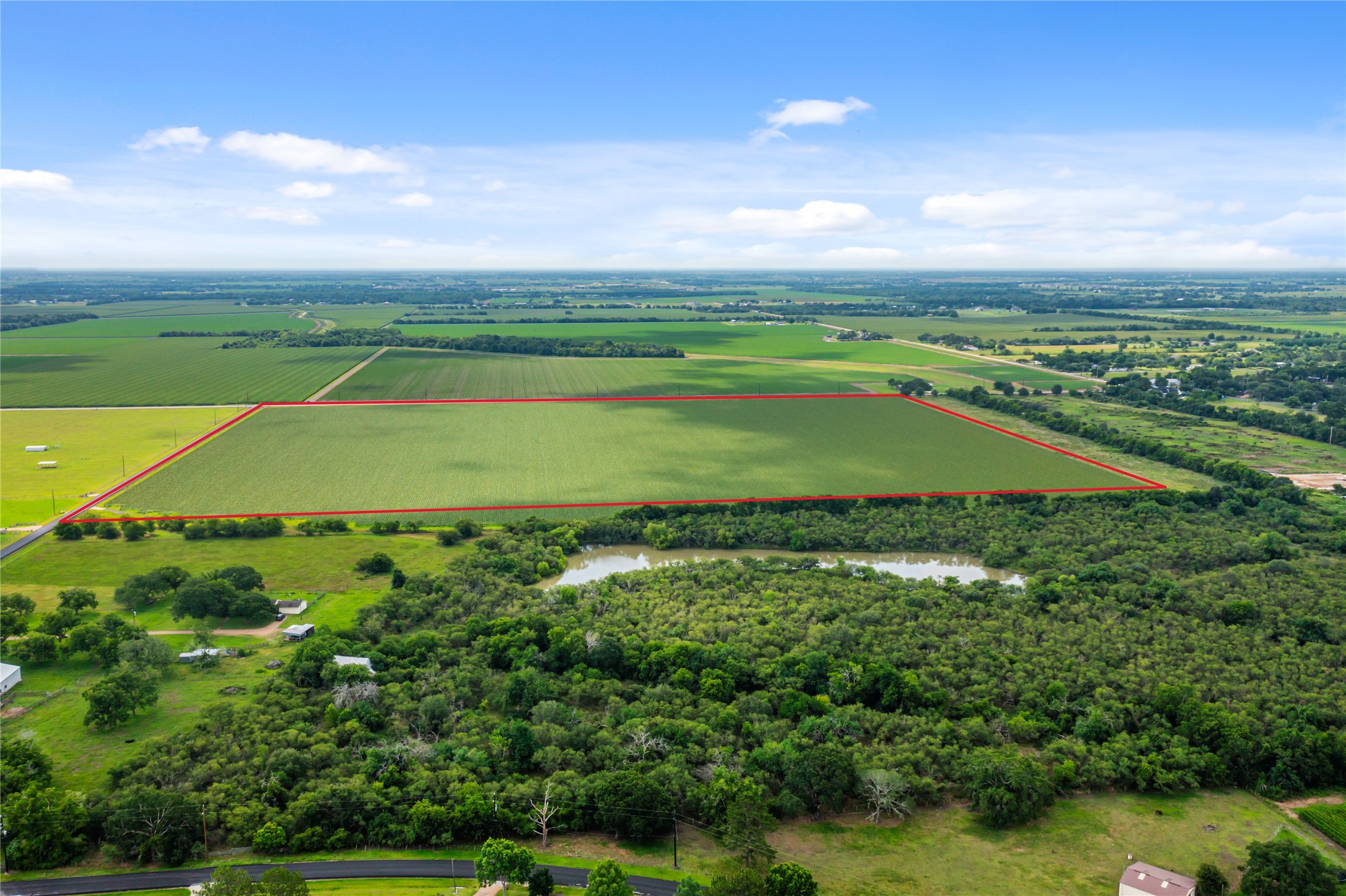 0 Kunz Road Rosenberg, TX 77471 - Photo 12 of 18 an aerial view of a houses with outdoor space and trees all around