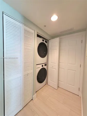 a bedroom with a bed and a closet