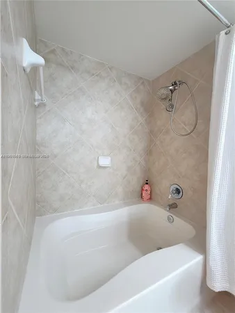 a bathroom with a bathtub