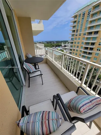 a view of balcony with furniture