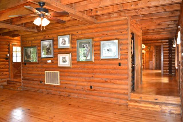 3064 Joe Mac Lipscomb Road Springfield, TN 37172 - Photo 9 of 20 This is a view from the living room. The area to the right leads to a half bath and then into the dining room and kitchen. The door on the far left is the front door.