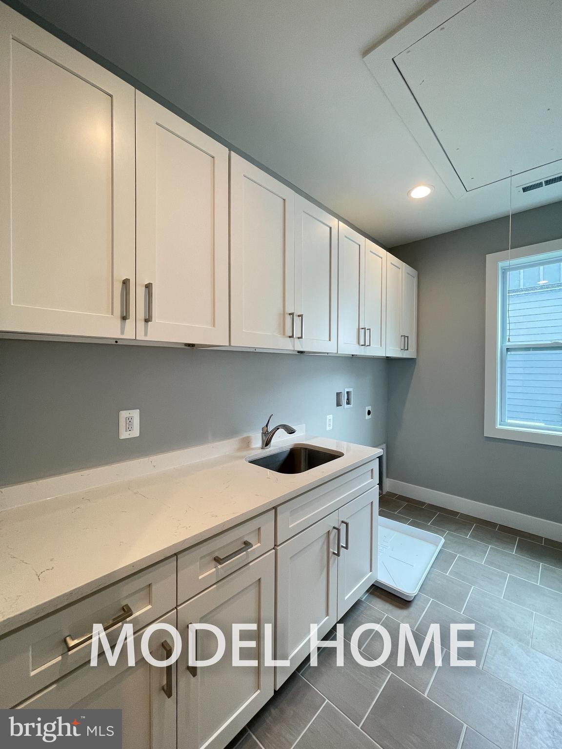 536 Walker Street Southwest Vienna, VA 22180 - Photo 36 of 57 a kitchen with stainless steel appliances granite countertop a sink and cabinets