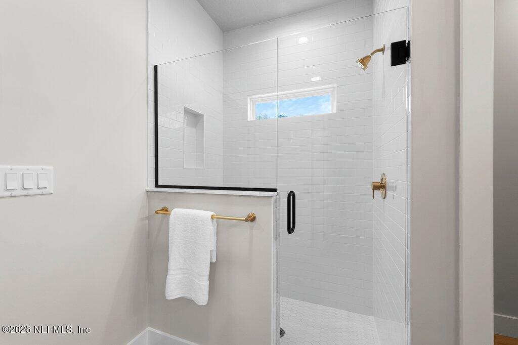 9019 Hipps Road Jacksonville, FL 32222 - Photo 34 of 35 a bathroom with a shower