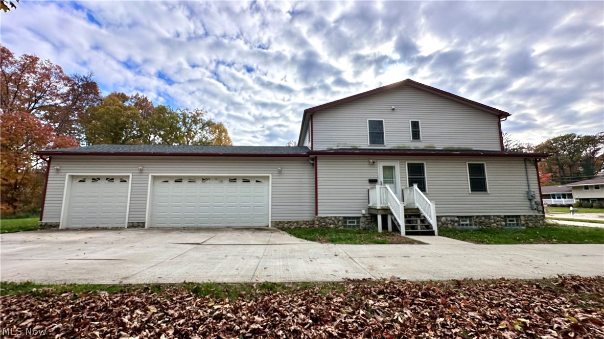 2603 Rockefeller Road Wickliffe, OH 44092 - Photo 30 of 34 Light gray siding exterior with a stone-finish foundation