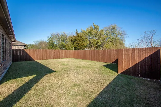 a view of outdoor space and yard