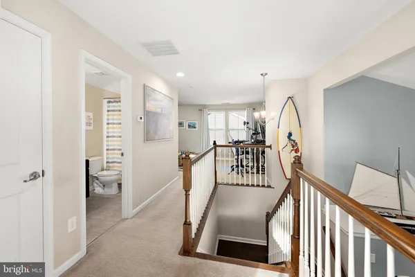 a view of a hallway with workspace