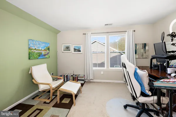 a room with furniture and a window
