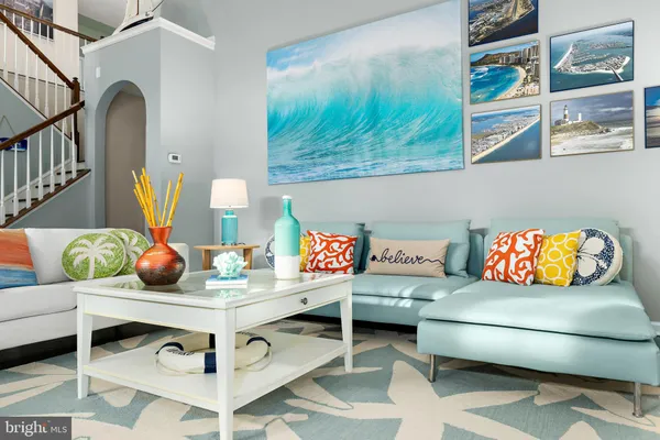 a living room with furniture and a table
