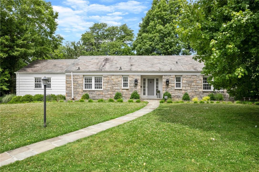 Mid-century modern ranch on .43 acres of beautiful level property in the heart of Quaker Ridge, just a short walk to worship, Quaker Ridge elementary school and 5-Corners shopping and restaurants.
