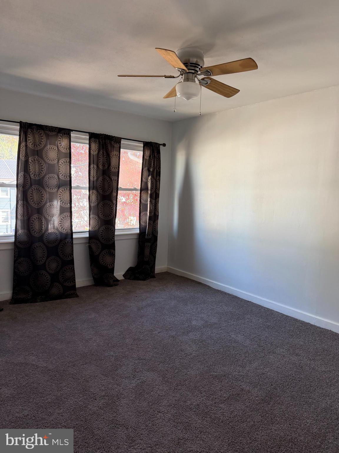 1036 Alcyon Drive Bellmawr, NJ 08031 - Photo 4 of 5 a view of an empty room with a window