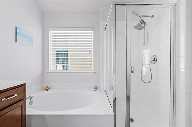 a room with a cabinets and a ceiling fan