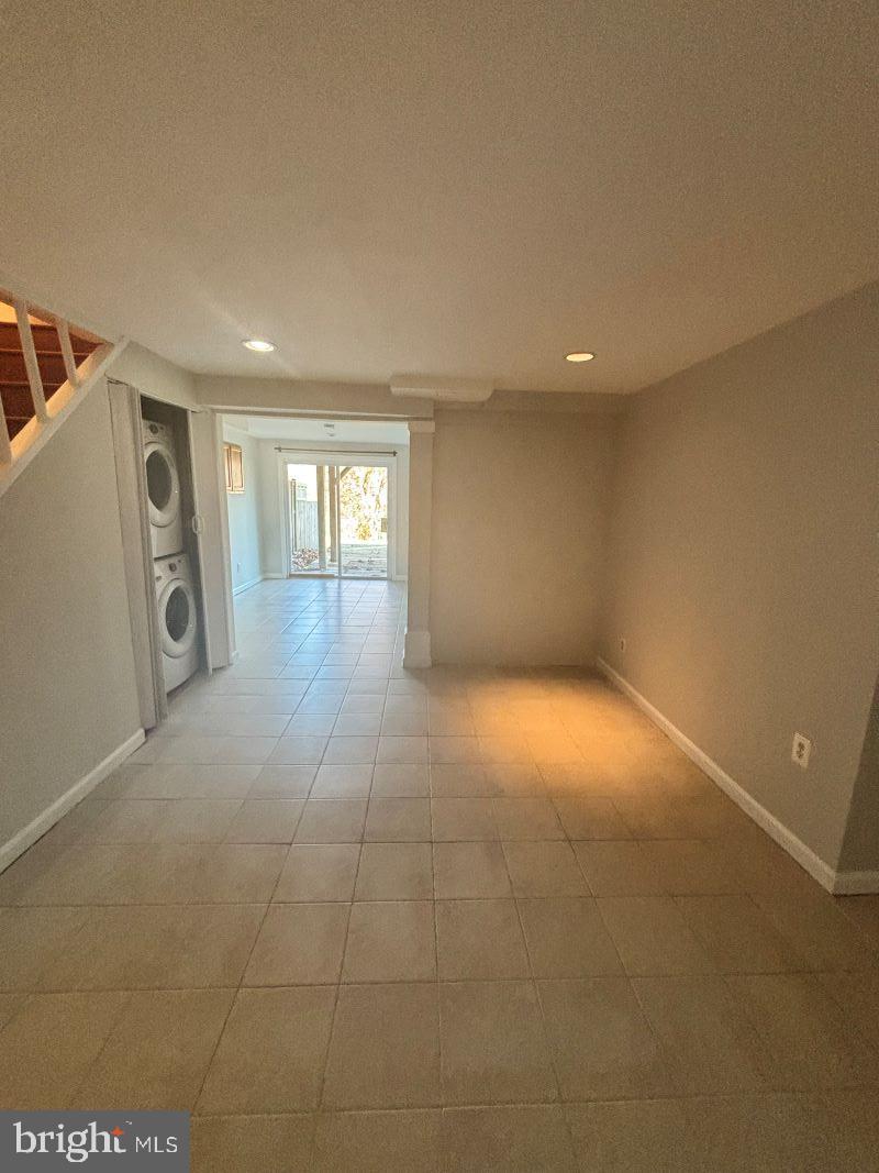 19397 Keymar Way Montgomery Village, MD 20886 - Photo 14 of 15 a view of an empty room with glass door