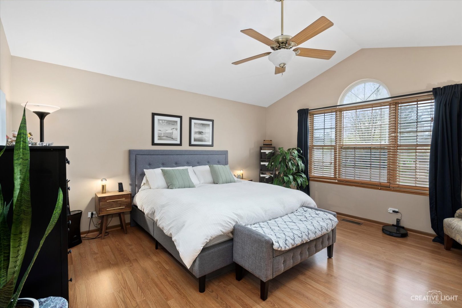 1180 Coldspring Road Elgin, IL 60120 - Photo 11 of 18 a bedroom with a large bed chandelier and a window