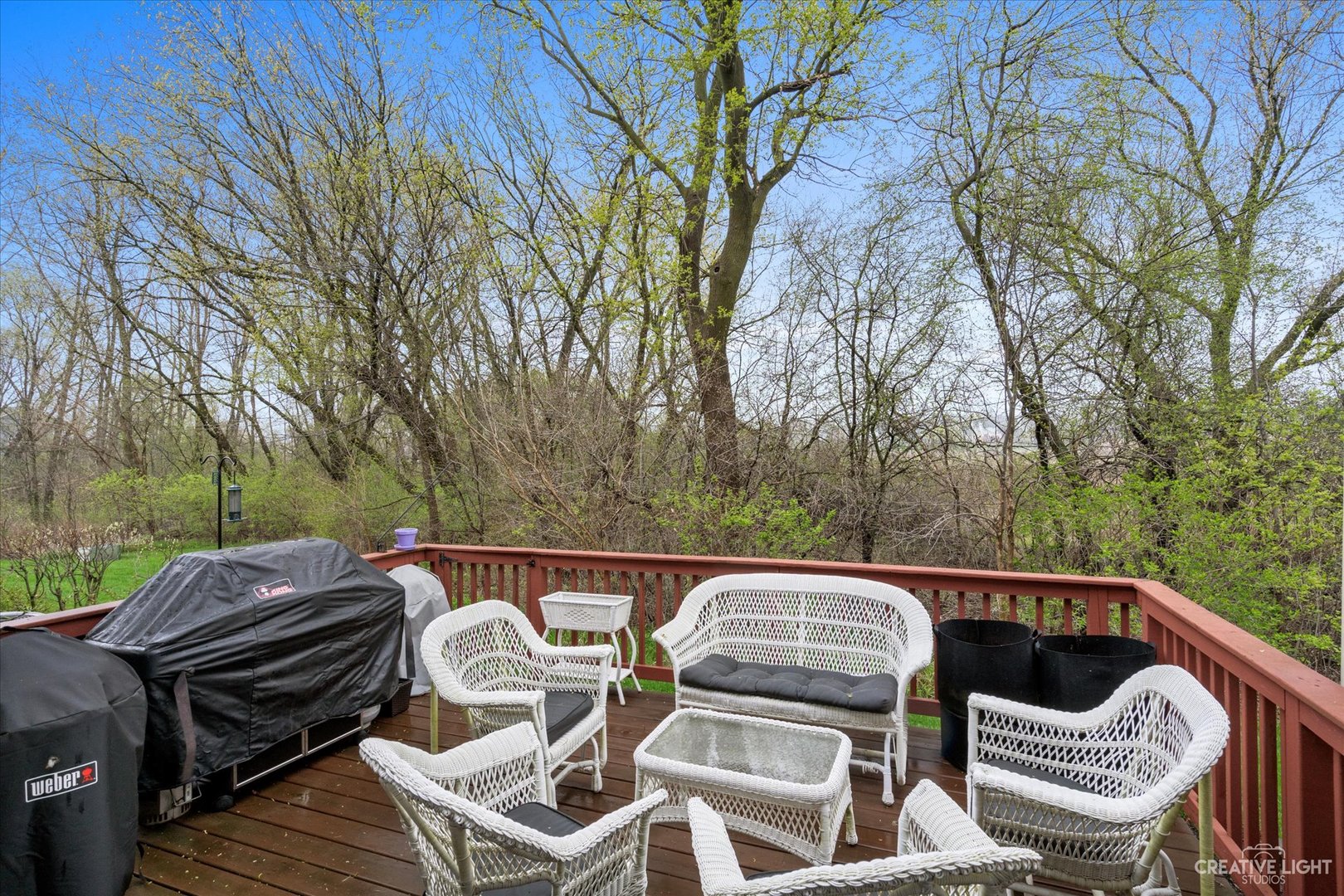 1180 Coldspring Road Elgin, IL 60120 - Photo 17 of 18 a view of a roof deck with couches and wooden fence
