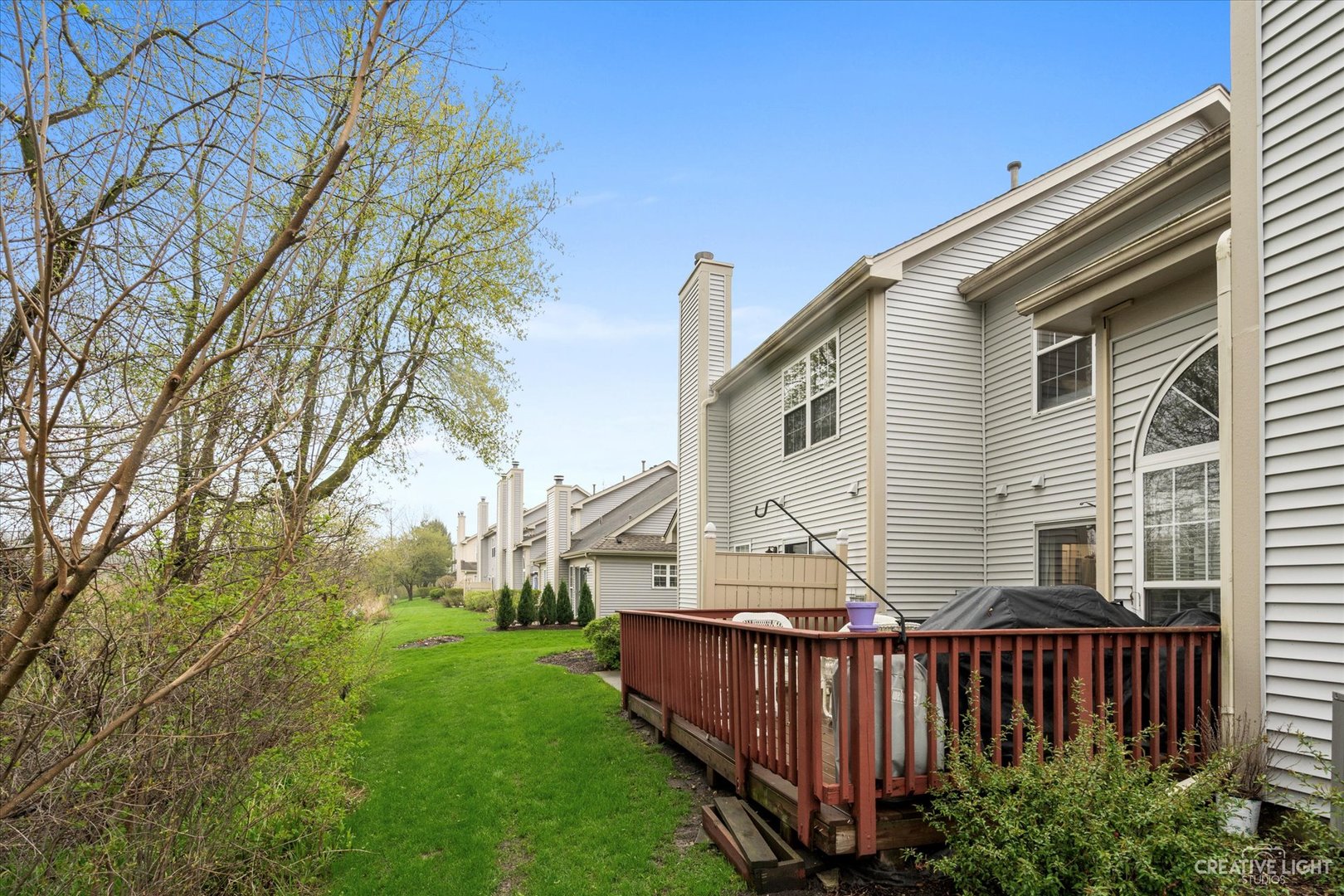 1180 Coldspring Road Elgin, IL 60120 - Photo 18 of 18 a view of a house with backyard and trees