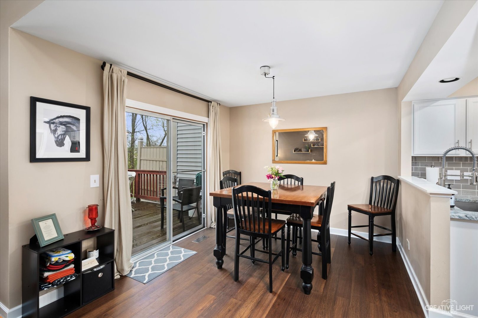 1180 Coldspring Road Elgin, IL 60120 - Photo 9 of 18 a view of a dining room with furniture and wooden floor