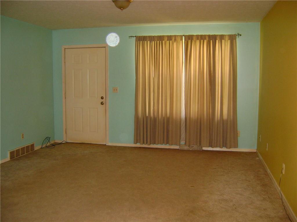 3489 East State Road Jamestown, PA 16134 - Photo 4 of 15 an empty room with windows