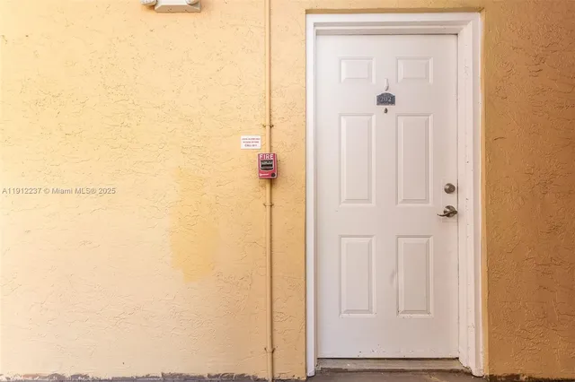 a view of front door with hallway
