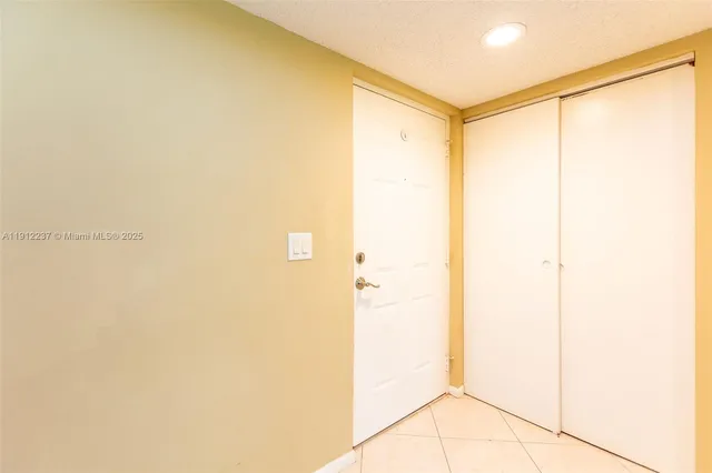 a bathroom with a shower and a shower