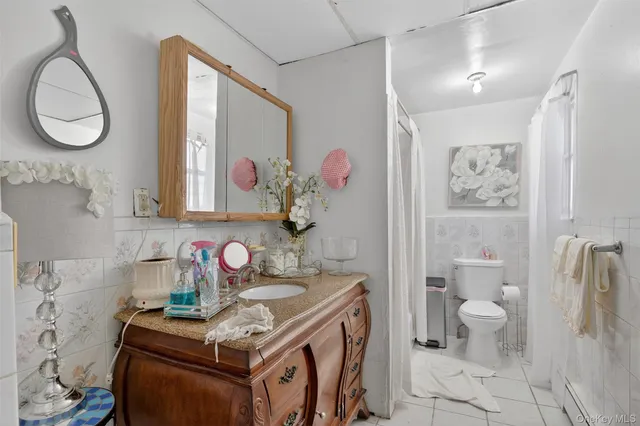 $699,000 | 57-59 Waring Place, Yonkers, NY 10703