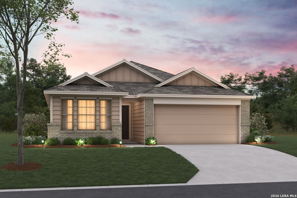 1036 Amber Lake Seguin, TX 78155 - Photo 1 of 27 a front view of a house with a yard and garage