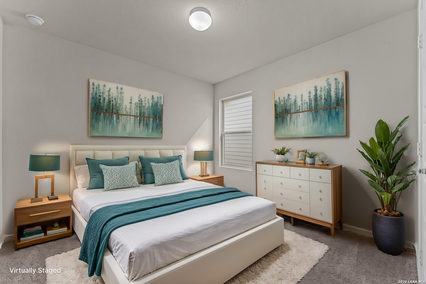 1036 Amber Lake Seguin, TX 78155 - Photo 7 of 27 a bedroom with a large bed and a potted plant