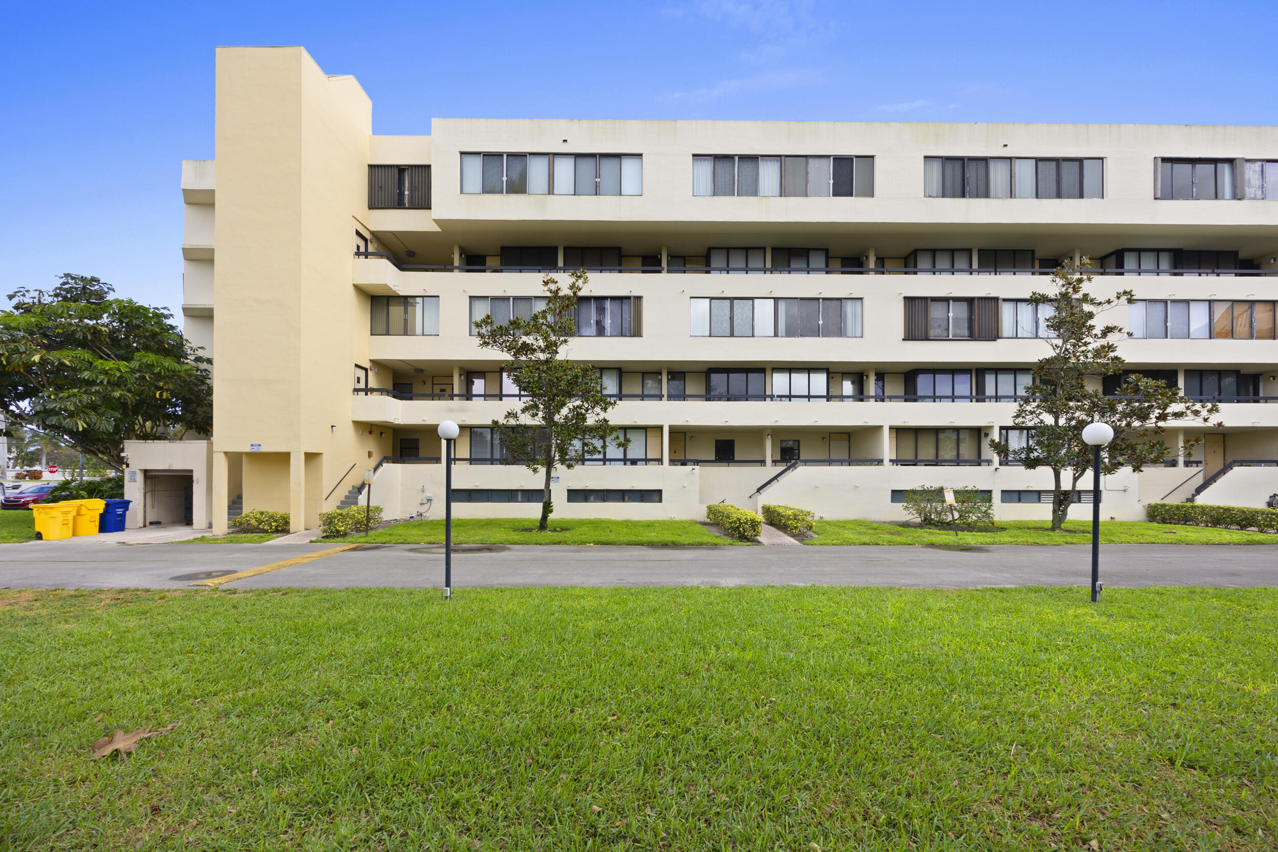 a view of a building with a yard
